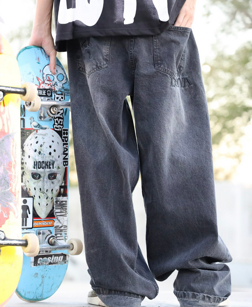 BLACK 'WALKING MAN' DENIM JEANS